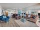 Cozy living room featuring comfortable seating, stylish decor, and an open layout for relaxed living at 4139 S Atlantic Ave # A302, New Smyrna Beach, FL 32169