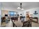 Bright living room boasting an ocean view through large sliding glass doors and a cozy seating area at 4139 S Atlantic Ave # A302, New Smyrna Beach, FL 32169