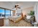 Bright main bedroom boasts ocean view access to the balcony, and an en suite bathroom at 4139 S Atlantic Ave # A302, New Smyrna Beach, FL 32169
