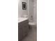 Clean bathroom featuring a sleek vanity, toilet, and shower/tub combination, designed for modern living at 4175 S Atlantic Ave # 2280, New Smyrna Beach, FL 32169