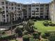 Beautiful courtyard showcasing lush landscaping, well-maintained grounds, and serene outdoor living space at 4175 S Atlantic Ave # 2280, New Smyrna Beach, FL 32169