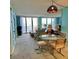 Open concept living and dining area with great views and tons of natural light at 421 S Atlantic Ave # 407, New Smyrna Beach, FL 32169