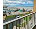 Balcony view of ocean, beach and parking lot at 421 S Atlantic Ave # 407, New Smyrna Beach, FL 32169