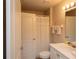 Well-lit bathroom featuring a shower with a white shower curtain at 424 Luna Bella Ln # 316, New Smyrna Beach, FL 32168