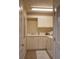 Bright laundry room with white cabinets, sink, countertop space and a washer and dryer at 424 Luna Bella Ln # 316, New Smyrna Beach, FL 32168