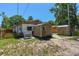 Backyard showcasing a shed, Generac generator, and fencing providing secure and functional outdoor space at 428 Perdita Ave, Edgewater, FL 32132