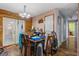 Dining room with wood-look flooring and natural light at 428 Perdita Ave, Edgewater, FL 32132