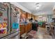 Kitchen with stainless-steel appliances, wooden cabinets, and an open layout at 428 Perdita Ave, Edgewater, FL 32132