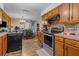 Kitchen featuring stainless-steel appliances and stylish cabinetry at 428 Perdita Ave, Edgewater, FL 32132
