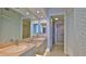 Bathroom featuring double vanity and enclosed glass shower at 4620 Riverwalk Village Ct # 7306, Ponce Inlet, FL 32127