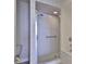 Bathroom featuring enclosed glass shower at 4620 Riverwalk Village Ct # 7306, Ponce Inlet, FL 32127
