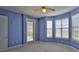 Bright bedroom with a private exterior door and a bay window nook at 4620 Riverwalk Village Ct # 7306, Ponce Inlet, FL 32127