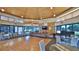 Elegant clubhouse with a spacious lounge area, pool table, and ample seating at 4620 Riverwalk Village Ct # 7306, Ponce Inlet, FL 32127