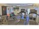 Well-equipped gym with a range of modern cardio machines and strength training equipment at 4620 Riverwalk Village Ct # 7306, Ponce Inlet, FL 32127