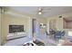 Nicely decorated living room, with nearby dining area, and media center at 4620 Riverwalk Village Ct # 7306, Ponce Inlet, FL 32127