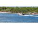 Open water view of boats cruising in a channel, perfect for enjoying boating activities at 4620 Riverwalk Village Ct # 7306, Ponce Inlet, FL 32127