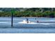 Open water view of boats cruising in a channel, perfect for enjoying boating activities at 4620 Riverwalk Village Ct # 7306, Ponce Inlet, FL 32127