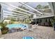 Screened-in pool and patio area, perfect for outdoor entertaining at 475 Spruceview Dr, Port Orange, FL 32127