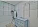 Walk-in closet equipped with an organizing system including racks and shelving, complemented by a light-blue chest of drawers at 475 Spruceview Dr, Port Orange, FL 32127