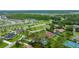 Aerial view of a home, nestled among the trees, near a lush green forest at 484 Sweet Bay Ave, New Smyrna Beach, FL 32168