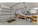 Spacious three car garage with multiple garage doors offering plenty of room for storage and projects at 484 Sweet Bay Ave, New Smyrna Beach, FL 32168