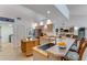 A bright kitchen with light-colored cabinets, stainless steel appliances, and a center island at 484 Sweet Bay Ave, New Smyrna Beach, FL 32168