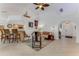 Inviting living area with an open floor plan, tile flooring, and comfortable seating at 484 Sweet Bay Ave, New Smyrna Beach, FL 32168