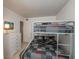 Bedroom featuring bunkbeds, a dresser and neutral walls and carpet at 4849 Saxon # C202, New Smyrna Beach, FL 32169