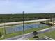 Well-maintained tennis court provides a great space for sports and recreation at 4849 Saxon # C202, New Smyrna Beach, FL 32169