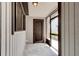 Inviting screened-in porch area, perfect for enjoying fresh air, with tile flooring and neutral walls at 488 Shorewood Ln, New Smyrna Beach, FL 32168