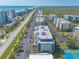 Aerial view of the beachfront community and the surrounding area at 5300 S Atlantic Ave # 1-603, New Smyrna Beach, FL 32169