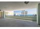 Balcony view to the ocean and adjacent building featuring a protective railing at 5300 S Atlantic Ave # 1-603, New Smyrna Beach, FL 32169