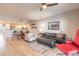Open concept condo living room area featuring dining area, updated furniture and lots of light at 5300 S Atlantic Ave # 1-603, New Smyrna Beach, FL 32169