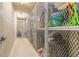 Secured storage with caged units, offering ample space to keep belongings organized and safe at 5300 S Atlantic Ave # 1-603, New Smyrna Beach, FL 32169