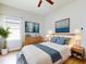 This bedroom offers a neutral color palette and plenty of natural light to enjoy at 534 Stowers Dr, New Smyrna Beach, FL 32168