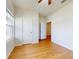 Inviting bedroom with wood-look flooring and a ceiling fan at 534 Stowers Dr, New Smyrna Beach, FL 32168