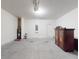 Spacious garage with an armoire at 534 Stowers Dr, New Smyrna Beach, FL 32168