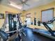 Spacious community gym featuring cardio equipment, weight machines, and fitness accessories at 535 Coral Trace Blvd, Edgewater, FL 32132