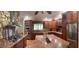 Gourmet kitchen with stainless steel appliances and granite countertops at 547 Cleo Ln, Deltona, FL 32738