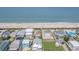 Stunning aerial view of beach houses on the coastline, with ocean views at 6320 S Atlantic Ave, New Smyrna Beach, FL 32169
