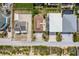 Aerial view showcases this coastal home with beach access, nearby community amenities, and close proximity to local shops at 6320 S Atlantic Ave, New Smyrna Beach, FL 32169
