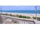 Stunning ocean view from the balcony overlooking the beach with beach access on a clear day at 6320 S Atlantic Ave, New Smyrna Beach, FL 32169
