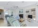 Relaxing living area with fireplace, ocean views, and stylish decor throughout at 6320 S Atlantic Ave, New Smyrna Beach, FL 32169
