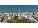 Aerial view of the light blue beach house in a coastal community, nestled near the ocean at 6871 S Atlantic Ave., New Smyrna Beach, FL 32169