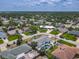 Wide aerial of the neighborhood, featuring the home's backyard pool at 7 Heather Ln, Ormond Beach, FL 32174