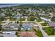 An aerial shot showcasing the pool and neighborhood of the property at 7 Heather Ln, Ormond Beach, FL 32174