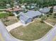 An aerial view showcases a charming single-story home with an attached garage and well-maintained lawn at 7 Heather Ln, Ormond Beach, FL 32174