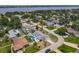An aerial view of the home showcasing the backyard pool and patio in the community at 7 Heather Ln, Ormond Beach, FL 32174