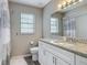 Bathroom featuring a granite countertop vanity, a commode, and a shower with a curtain at 7 Heather Ln, Ormond Beach, FL 32174