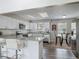 Bright kitchen featuring white cabinets, stainless steel appliances and granite countertops at 7 Heather Ln, Ormond Beach, FL 32174